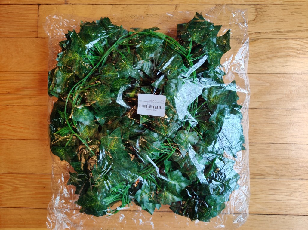 Fake vines are an easy way to jazz up a bunny playpen.